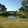 A fishing pond provides a peaceful accompaniment to the Vineyard Park Nature Trail.
