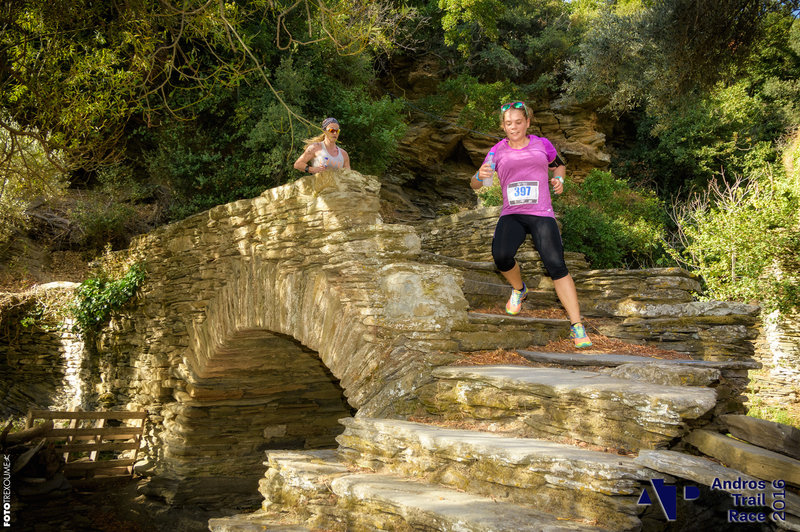Runners navigate The Bridge of Love in Episkopeio Village.