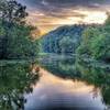 A sunset offers a beautiful backdrop to the meandering waters of the James River.