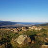 Looking south from Boulder Hill, the view encompasses the mountains and inlets surrounding Lower Hutt and Petone.