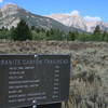 Signage at Granite Canyon Trailhead offers well-marked distances to major locations in the area.