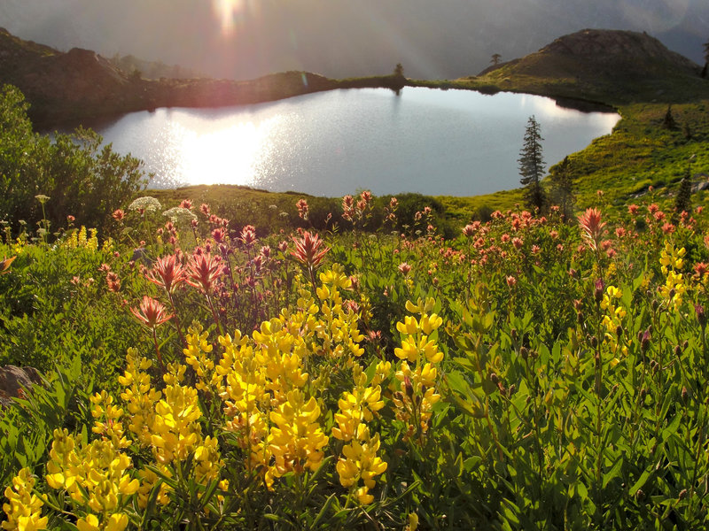 The sun sets over Diamond Lake on the Four Lakes Trail.