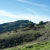 The trail can be seen making its way toward Mindego Hill off in the distance.