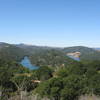 Upper San Leandro Reservoir (center) and northern Anthony Chabot Regional Park (far left) glimmer in the distance from the Soaring Hawk Trail.