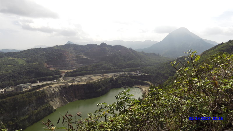 A giant rock quarry is your treat for reaching the end of the trail.