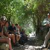 Hikers rest along the Apatouria Village Trail Number 8.