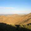 A gorgeous view awaits from the top of the Sunrise Trail. The 136th Street Spur can be seen headed down the mountain.