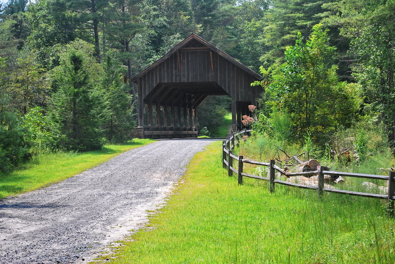 Enjoy this covered bridge on Buck Forest Road above High Falls at DuPont State Forest.