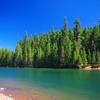 The lake water in the North Arm part of Timothy Lake can appear bluish green. Photo by Gene Blick.