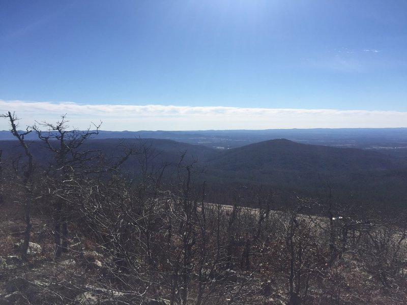 Enjoy this 360-degree view of the mountain range from the trail. Below is the infamous Prom Wall. Legend has it that asking someone to prom with spray paint here may result in community service.