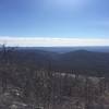 Enjoy this 360-degree view of the mountain range from the trail. Below is the infamous Prom Wall. Legend has it that asking someone to prom with spray paint here may result in community service.