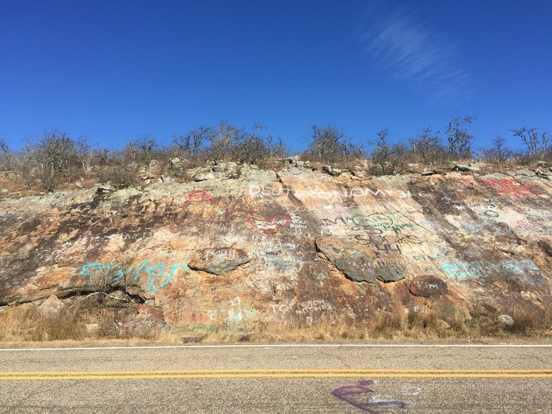 Teenage angst and rebellion marks the cliff below the trail in the Ouachita Wilderness. Don't be worried. No feral teenagers have been spotted on the trail, as there is no reliable cell service.