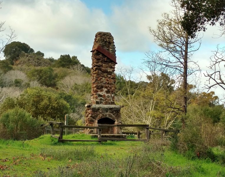 An old fireplace and chimney marks all that's left of a miner's house perhaps?