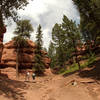 A group takes some photos of the rock formations at Red Rocks.