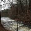 Water flows heavily from the creek into Stone Mountain Lake after a couple days of rain.