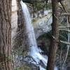 Raven Cliff Falls cascades onto the rocks below.