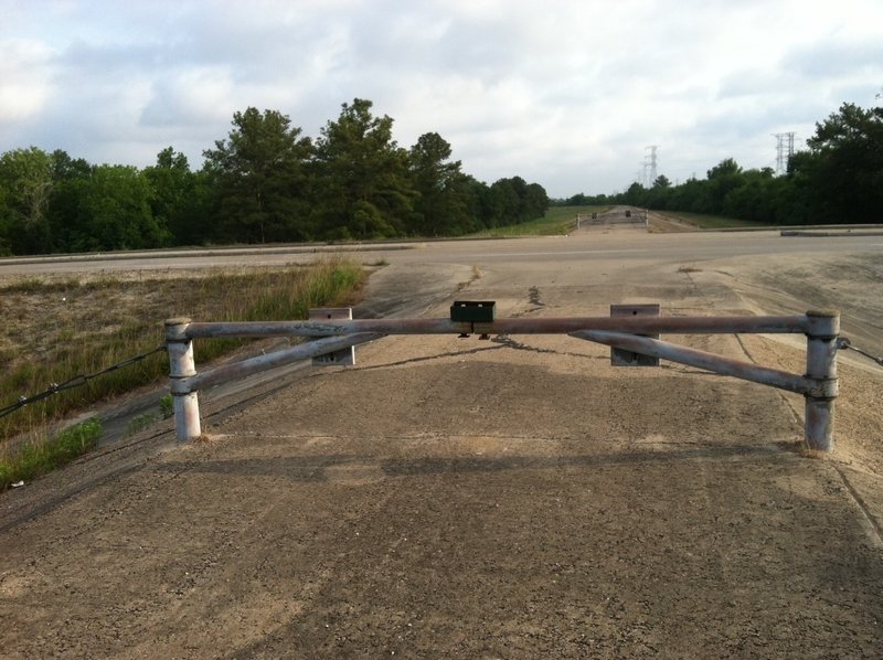 Addicks Dam Road: Crossing at Clay Road, looking north.