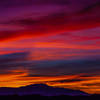 The clouds erupt in wonderful colors as we reach the summit of Mt. Ryan.