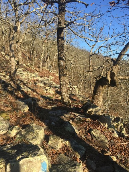 Loose rock and boulder hang from the shoulder. Tread carefully if you want to die older.