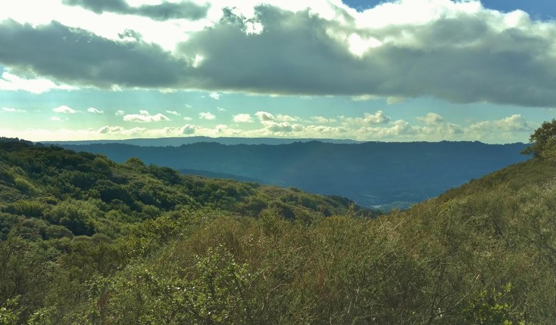 Santa Cruz Mountains with a glimpse of Lexington Reservoir, seen looking southwest from high on Kennedy Trail