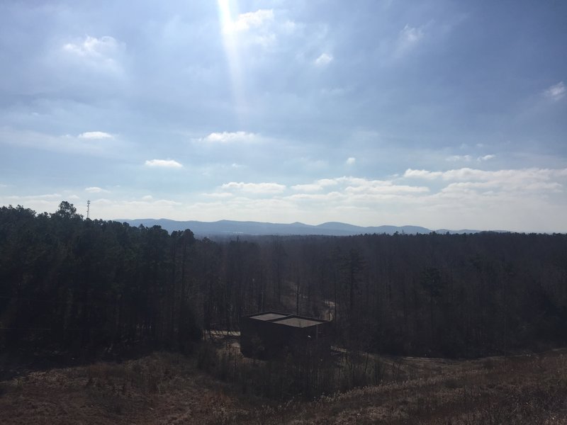 A huge pause-record/play button (seen below) protrudes from the valley. If quiet, one can hear it play back Carl Sagan lectures and Norman Greenbaum recordings.