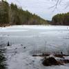 Eastman Meadow Trail offers pleasant views of a frozen Spatterdock Pond during the winter.