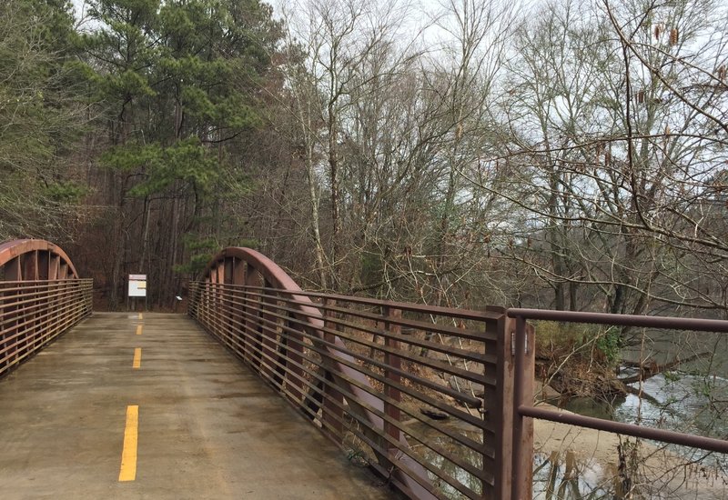 Enjoy the view from this footbridge just before the main trail entrances (WP 02-03).