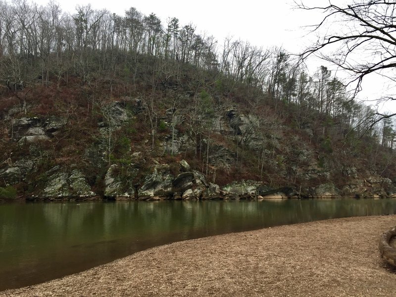 There's a lovely view of rocky cliff formations across the river from the beach at WP 11.