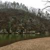 There's a lovely view of rocky cliff formations across the river from the beach at WP 11.