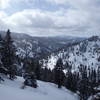 A heavy blanket of snow covers the hills around Summit Flat Road.