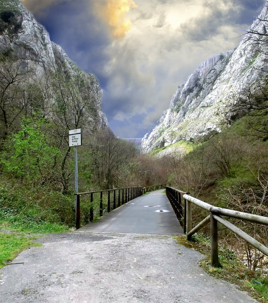 A sturdy bridge allows you to continue enjoying the view as you cross the river.