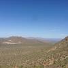 Enjoy this view from the cave at the trail's end. The Fountain Hills are located in the distance to the right.