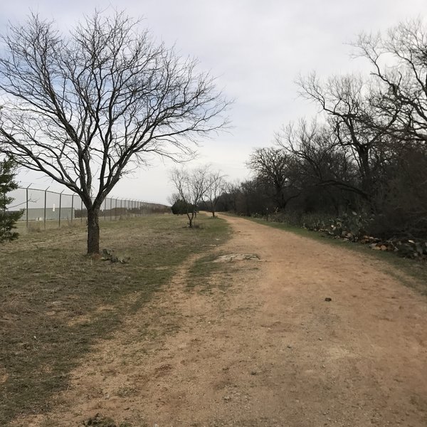 The former Fort Wolters is located on the north side of the trail.