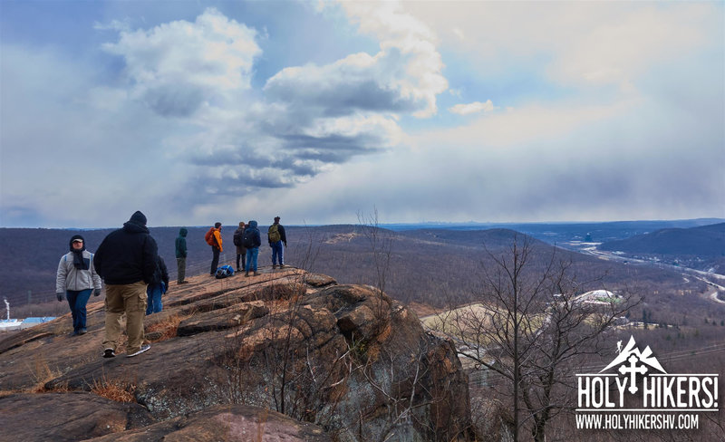 The group looks toward Mahwah, NJ and New York City off on the horizon.