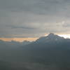 A storm rolls through the valley below the Saddleback Trail.