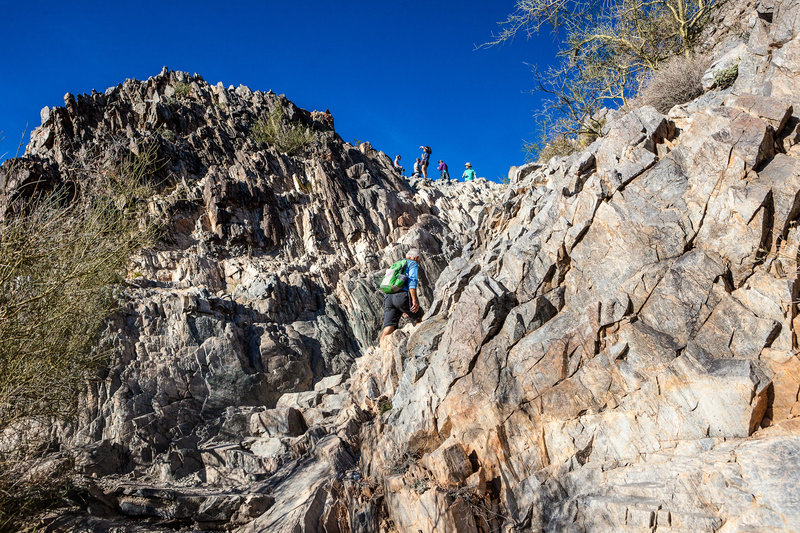 Almost to the summit, you'll have to navigate this steep, rocky section to reach your prize.