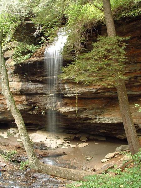 The shower-like spray of Moore Cove Falls is inviting in the oppressive heat of summer.