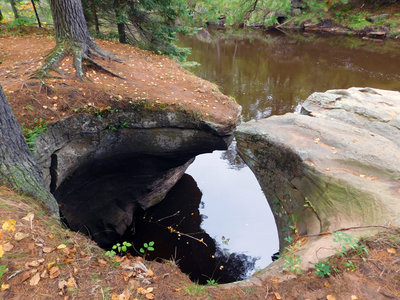 This is an example of a pothole or "kettle" on the bank of the Kettle River along the Hell's Gate Trail.