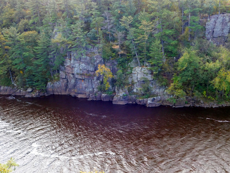 Towering cliffs constrain this section of the St. Croix River.