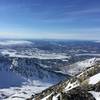 In March, enjoy expansive, snow-covered views from just below the summit on Matanuska Peak.