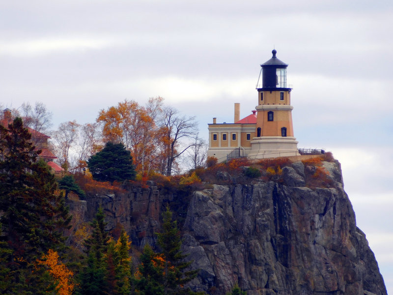 Split Rock Lighthouse stands perched atop the cliff.