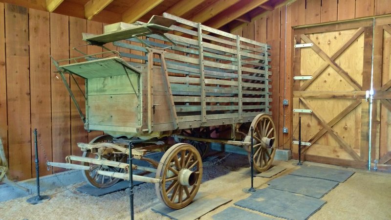 Some sort of old ranch wagon (no descriptive plaque yet...) awaits inside one of the old structures.