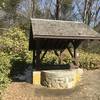 A wishing well is located just off the trail.