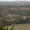 The view from the top of the Prairie Vista Trail looks east toward the river and the town of Brandon, South Dakota.