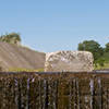 An athlete charges through the spillway canal that characterizes the Meadowlark Trail.