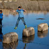 If there is water in the spillway, a little effort will keep your feet dry.