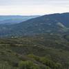 The Aquinas Trail can be seen snaking along the ridge below you in El Sereno Open Space.