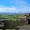 A hiker enjoys the view along the Strange Edge.