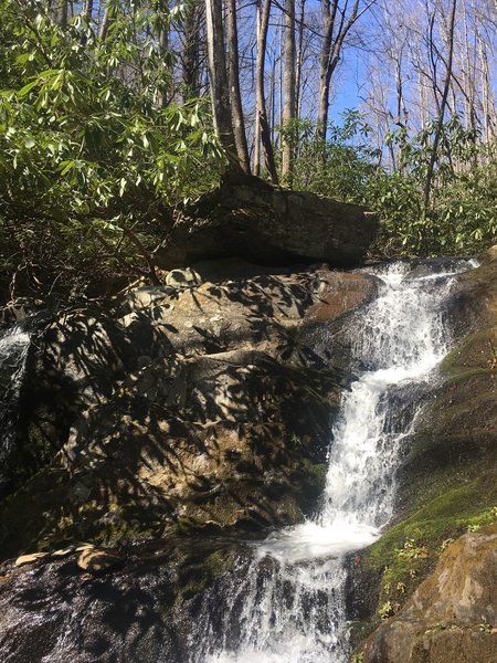 Widow's Creek cascades over the rocks near Widow's Creek Site A backcountry campsite.