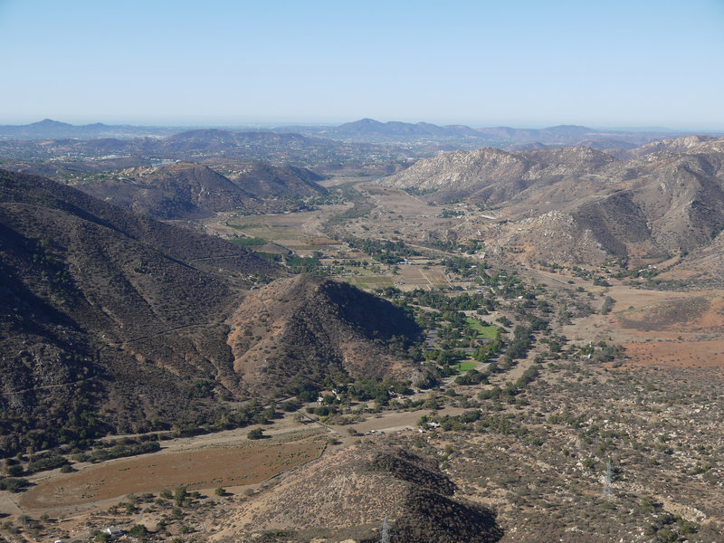 Enjoy the view looking back at El Monte County Park from the prow of El Cajon Mountain.